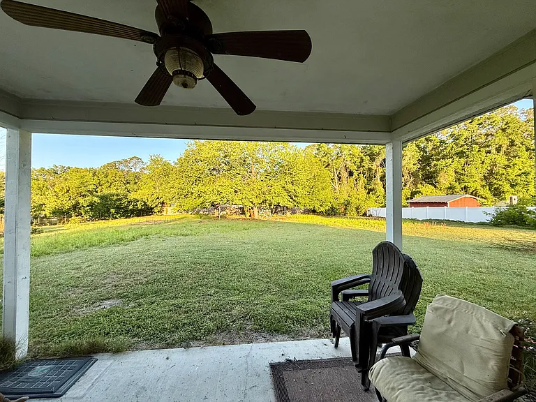 Relax or grill on the covered back porch