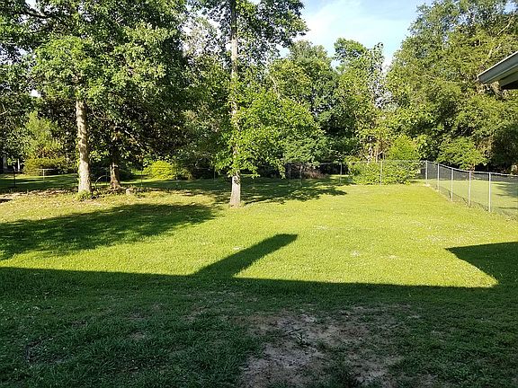 More land beyond fence