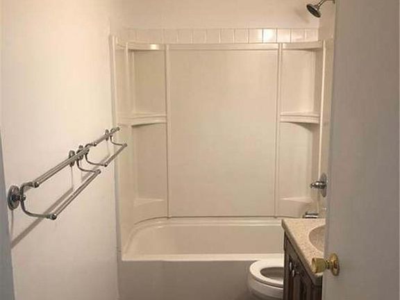 Bathroom with linen closet