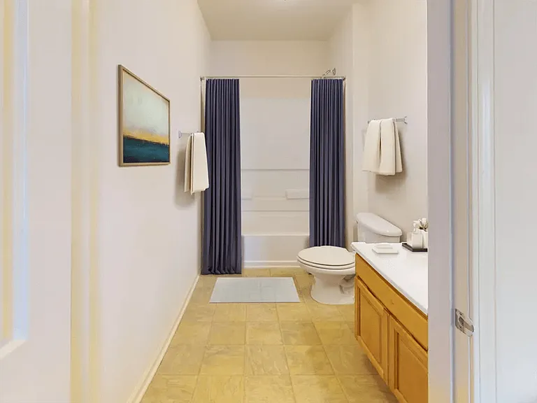 Tiled Flooring & Well-Lit Vanities