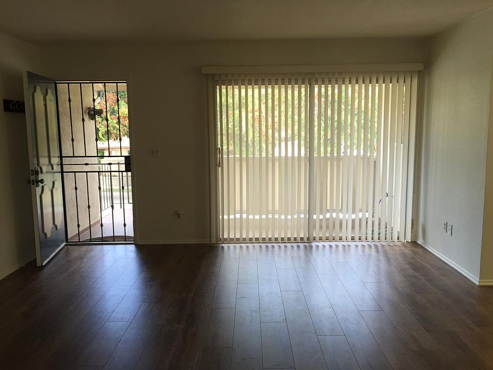Living room with lots of natural light and brand new floorin