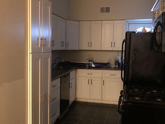 First Floor Kitchen: Gas stove, Dishwasher, Microwave and Full Size Refrigerator.