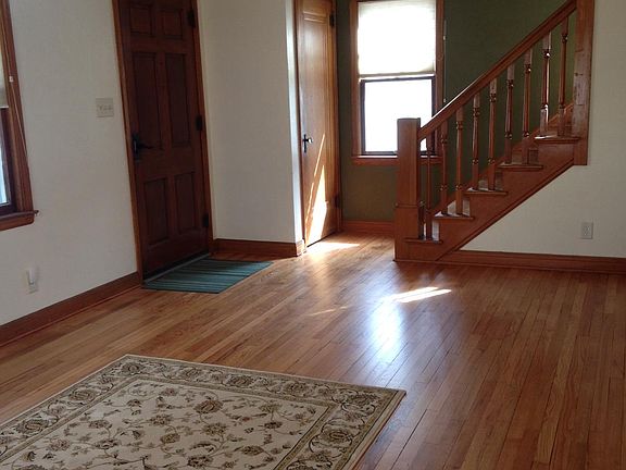 living room with stairs up