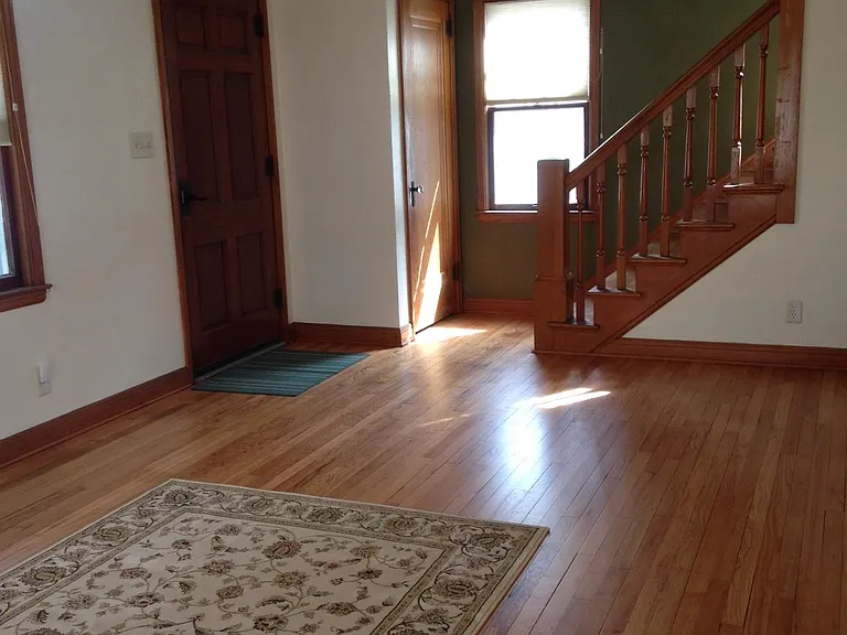 living room with stairs up
