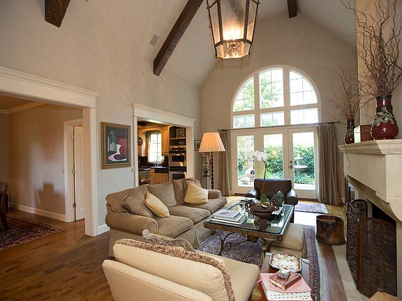 Living area showing French doors to patio and hardwoods