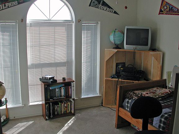 Large secondary b'rooms are split from master bedroom.