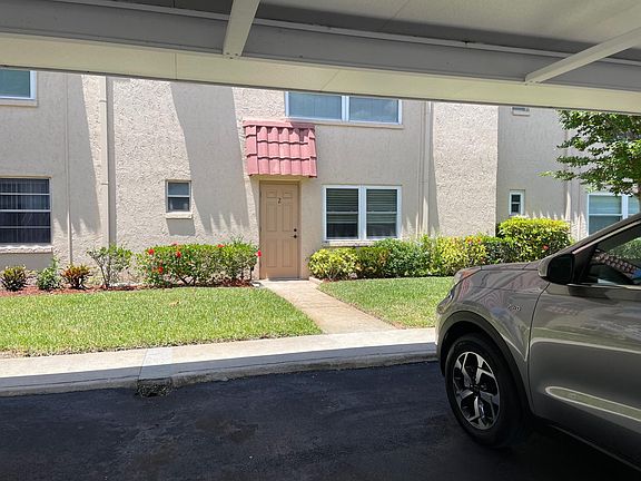 Assigned Carport space right in front of back door!