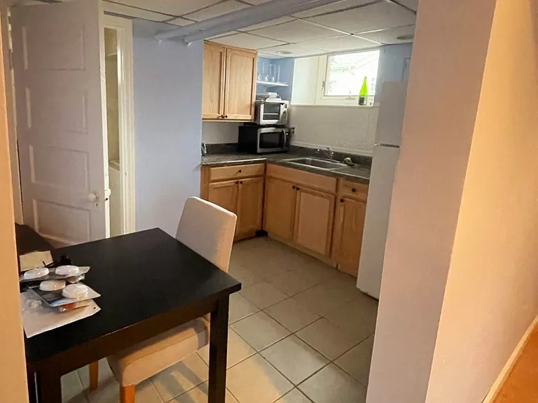kitchenette- bathroom is far door- table not included