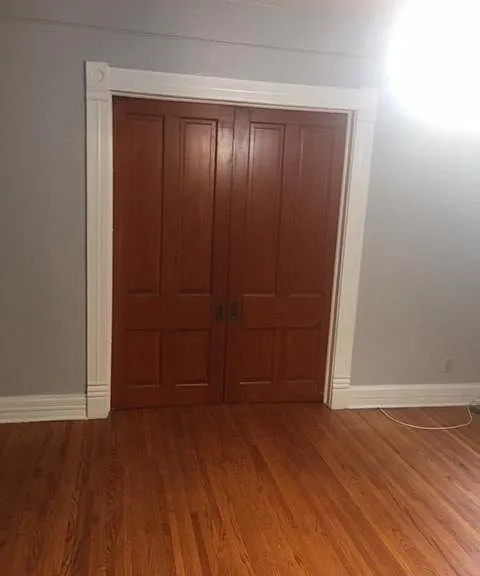 pocket doors separate bedroom from living room