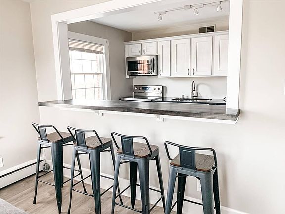 Furnished with bar stools