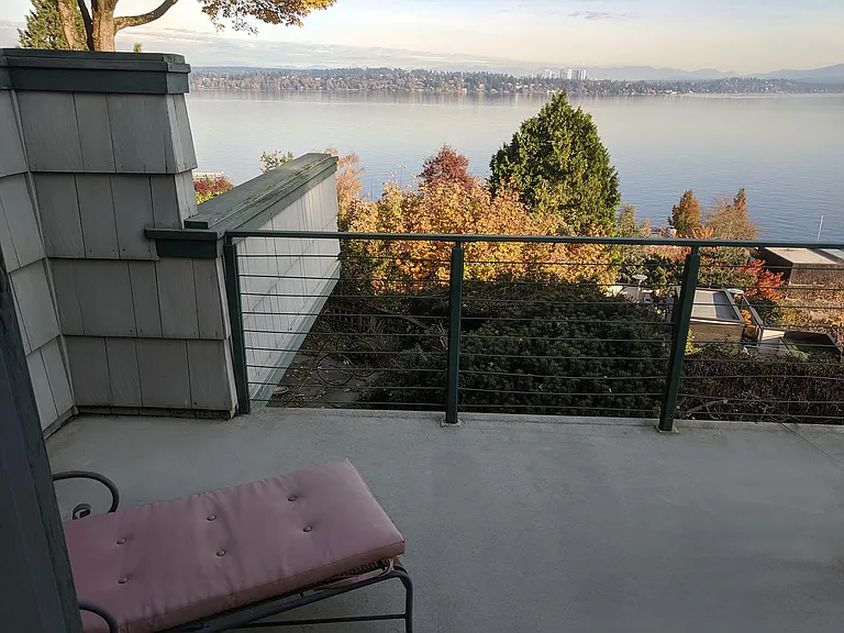 Bedroom #4 has separate patio. Bellevue visible across the lake.