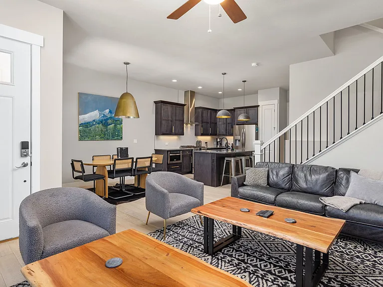 Living Room and Kitchen (furniture pictured is for staging purposes only - unfurnished unit)