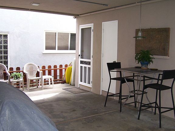 Back patio between unit and garage
