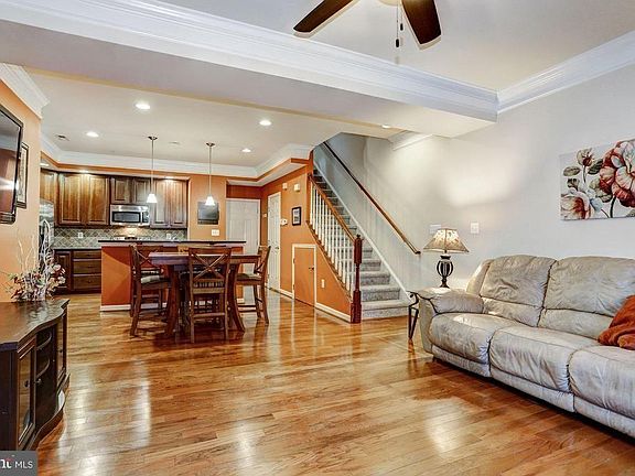 Main level open plan great room with hardwood floors.