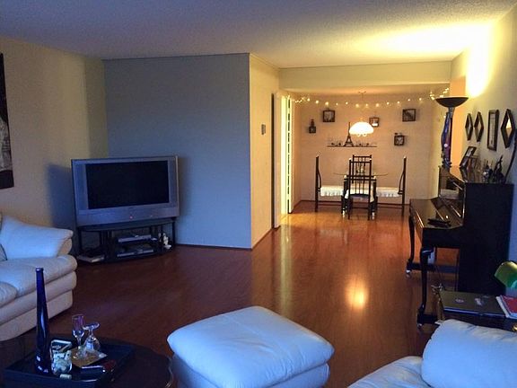 Living room opens to dining