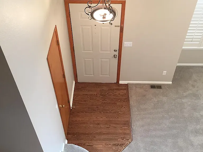 The upper floor has the master bedroom with a master bath and a walk-in closet. It has three additional bedrooms and a full bath.