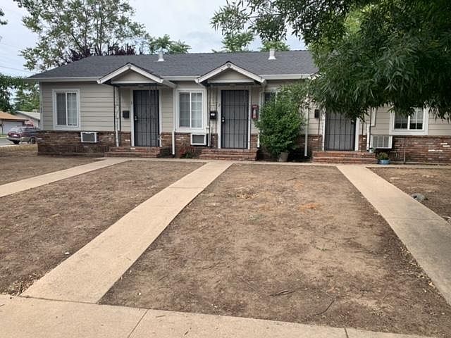 Front of property (landscaping pending). Unit is on the far left.
