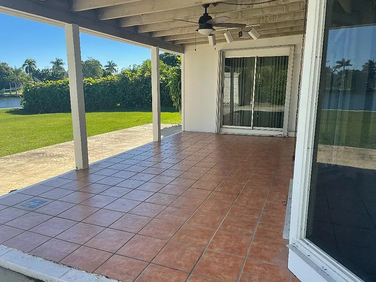 Back Covered Tiled Patio
