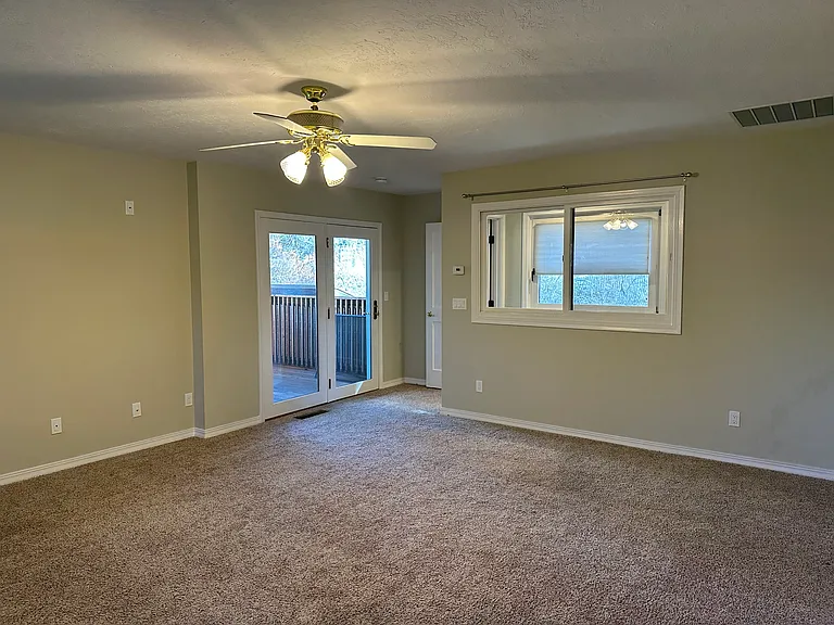 Across master to stairway right and deck, left