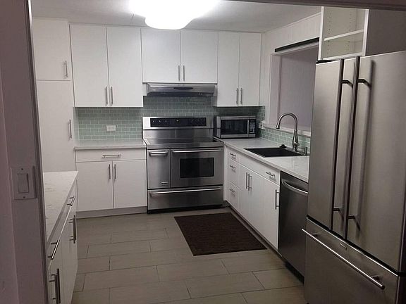 Kitchen with custom cabinets and upgraded features