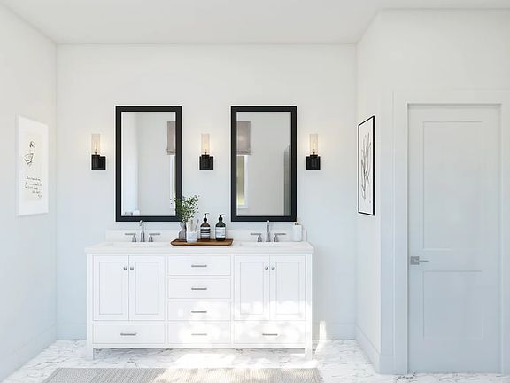 Primary bath with dual sinks and chrome fixtures