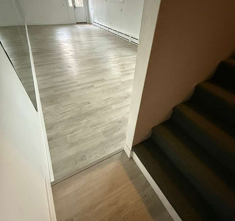 Stair platform into studio