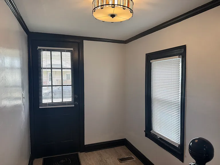 Front entry way with beautiful lighting