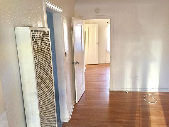 Living Room Looking Into Bedroom/Bathroom Area