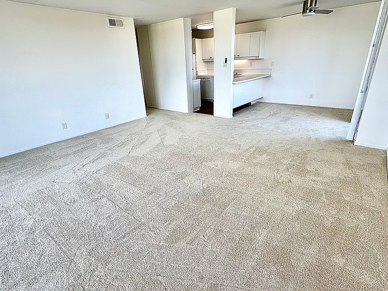 Apt #304 looking from living room towards kitchen/dining room