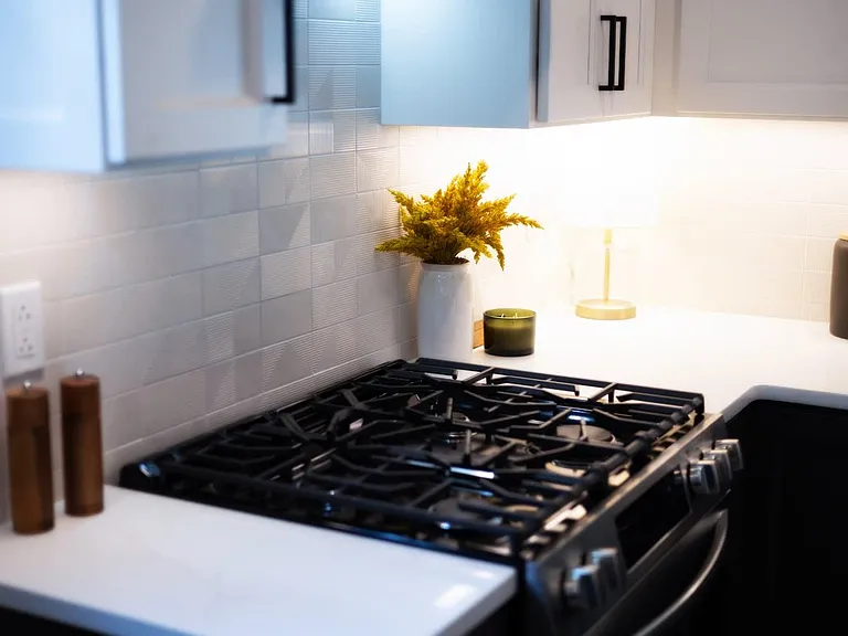 Make your dinner parties a night to remember with our sleek kitchen and dining area! Add the perfect touch of sophistication and style to your guests' evening. #ElevateYourExperience