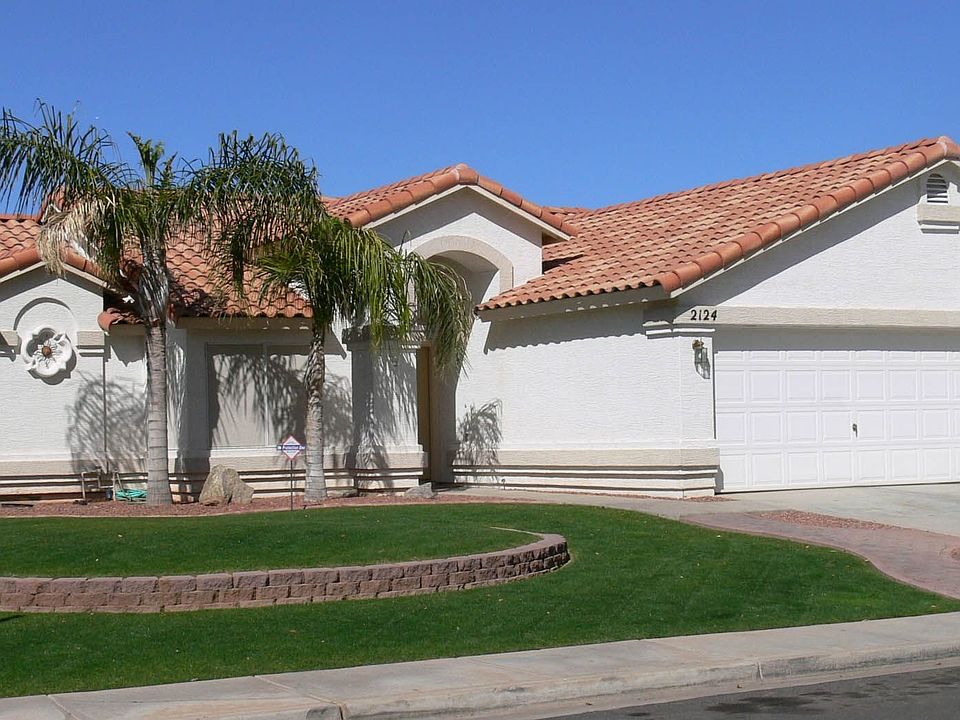 Corner home with terraced yard