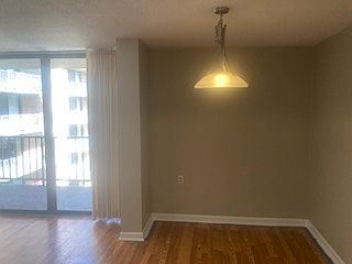 View from kitchen doorway to dining room and living room