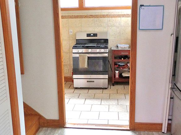 from rear door entrance, looking at kitchen