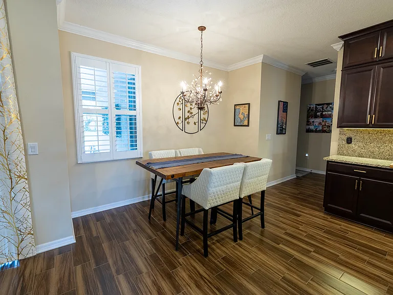 Dining Nook & Hallway to 3 bedrooms + 2 baths