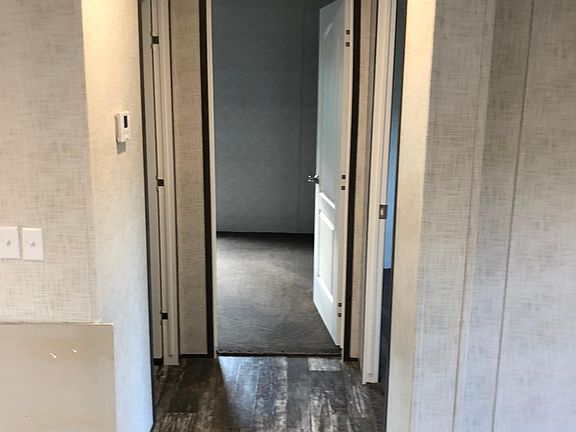 Hall to bedrooms 2 & 3 along with guest bath