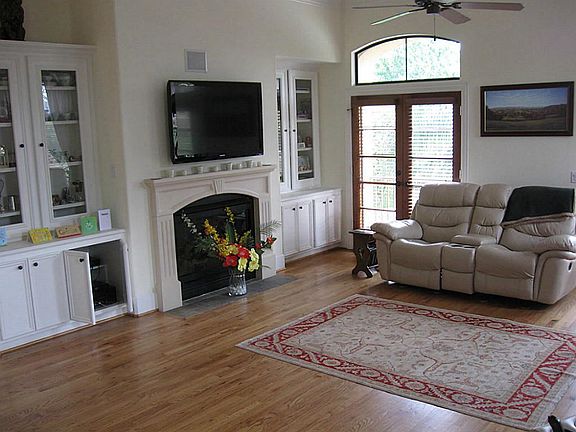 Cheery living room with french doors and lots of light