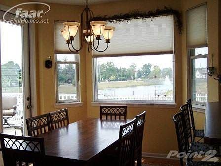 Bay window overlooking fountained pond