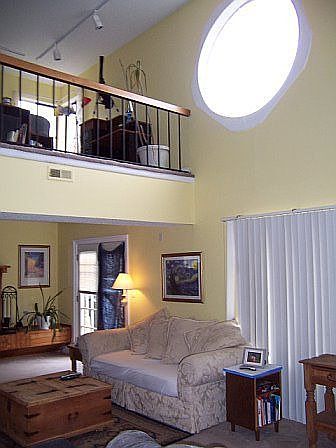 Spacious Living Room Area with a view of the Loft!