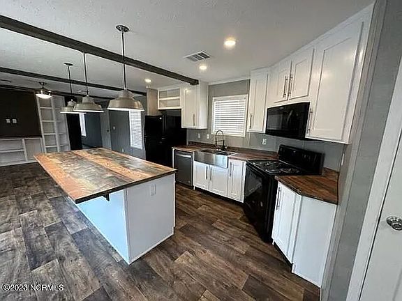 All appliances included; Refrigerator, Stove, Oven, Microwave, Dishwasher