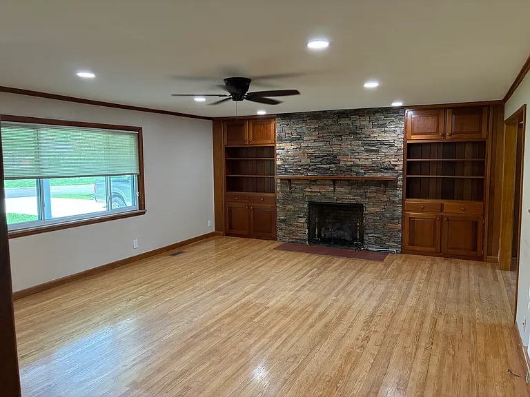 Front room, living room, attaches to dining room