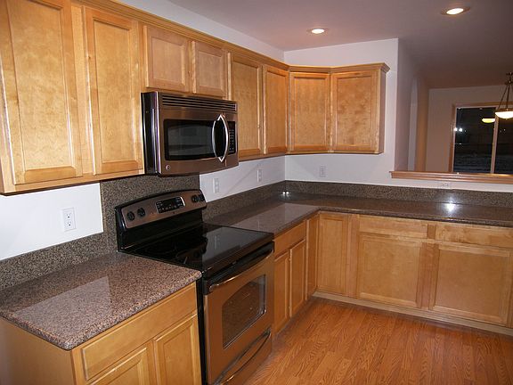 Solid Granite counter tops/ SS appliances