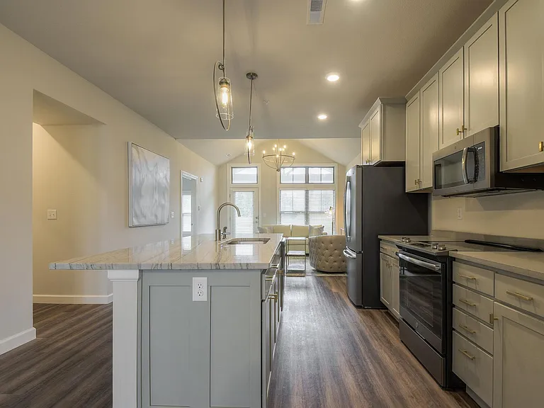 The Cabrillo- Kitchen looking into Great Room/Living Area
