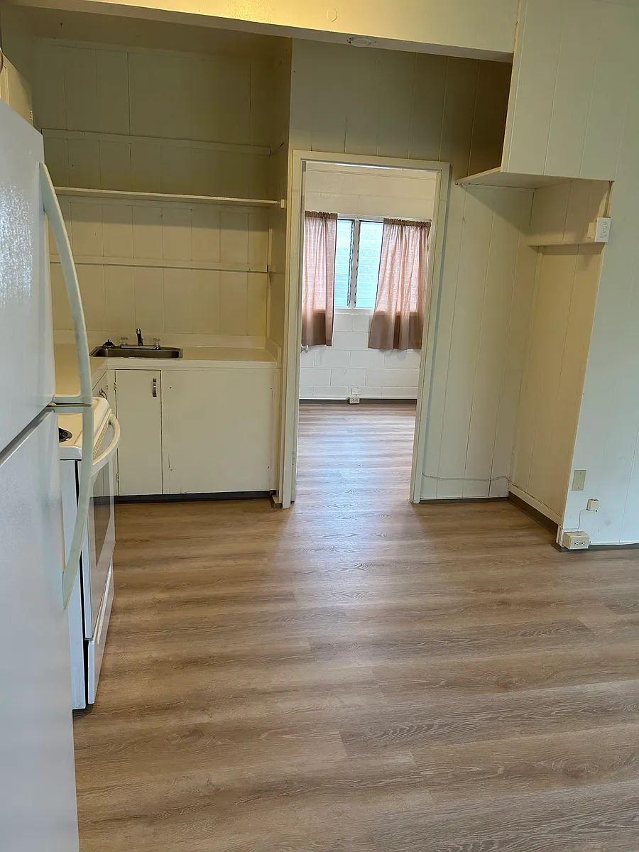 Kitchen with entry area to bedroom - 311 Lehua St