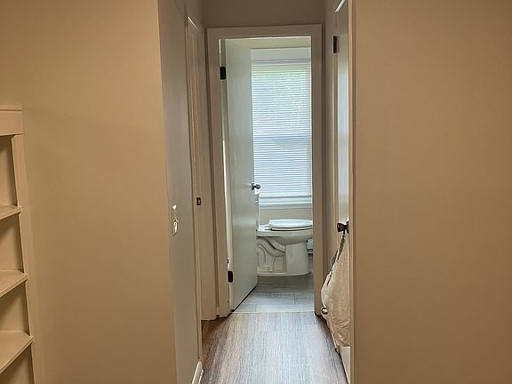 hallway to bath and bedroom
