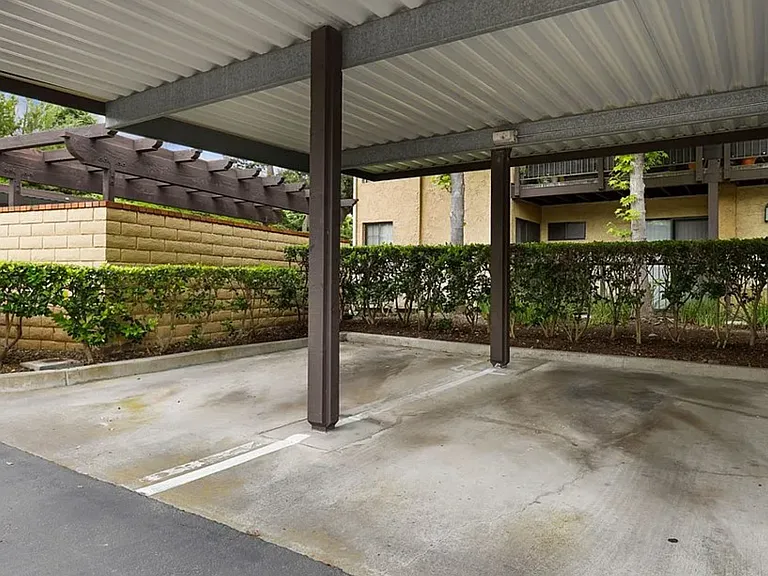 Dedicated, covered carport.