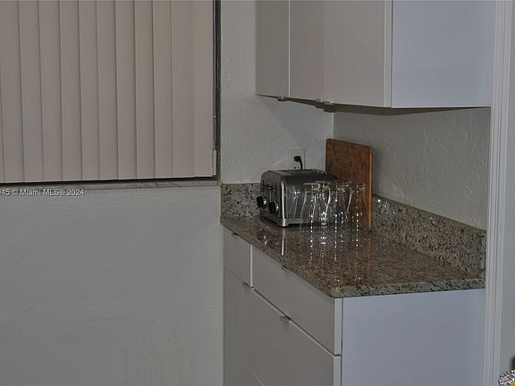 5th image of 9441 Live Oak Pl APT 108