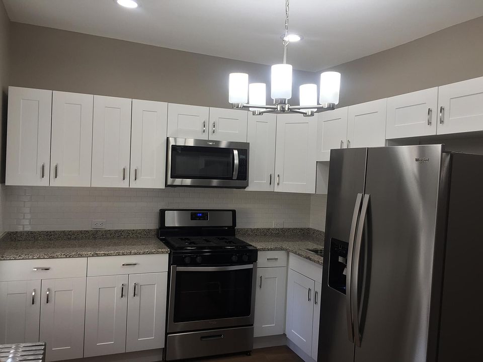 Kitchen, New stainless steel appliances and granite countertops