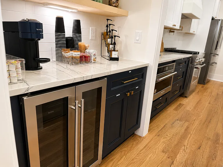 Fully stocked kitchen with quality dishes, glasses, pots and pans, baking sheets, mixing bowls, small appliances, utensils, wine glasses, kids dishes and everything you can think of!