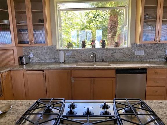 GAS 5 BURNER STOVE TOP. DISHWASHER. VIEW OUT THAT WINDOW IS EAST. WEST MAUI MOUNTAINS AND THE SUN RISES OVER THOSE MOUNTAINS