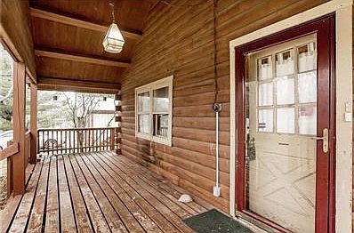 Partial wrap around covered porch